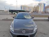 Volkswagen Passat 2014 года за 9 000 000 тг. в Астана
