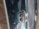Передний бампер BMW E39 с усилителем и омывателем фар за 50 000 тг. в Алматы – фото 4