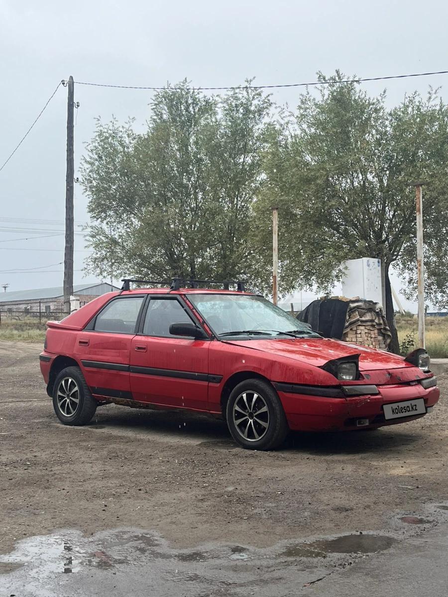Mazda 323 1990 г.