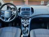 Chevrolet Aveo 2014 года за 3 600 000 тг. в Актобе – фото 4